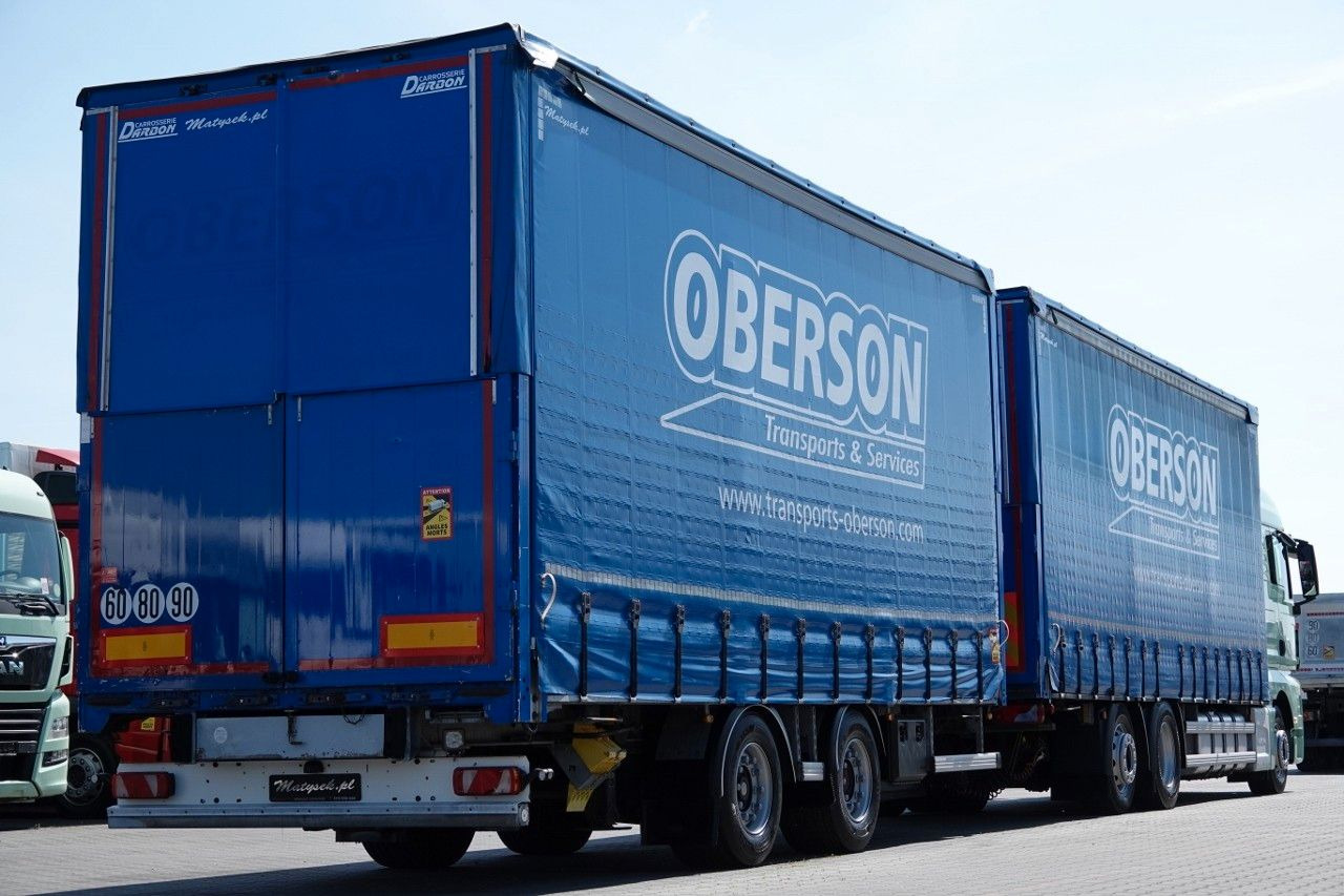 MAN TGX 26.460 / ZESTAW TANDEM PRZEJAZDOWY / 120 M3 - Kravas automašīna ar tentu: foto 4 MAN TGX 26.460 / ZESTAW TANDEM PRZEJAZDOWY / 120 M3 - Kravas automašīna ar tentu: foto 4