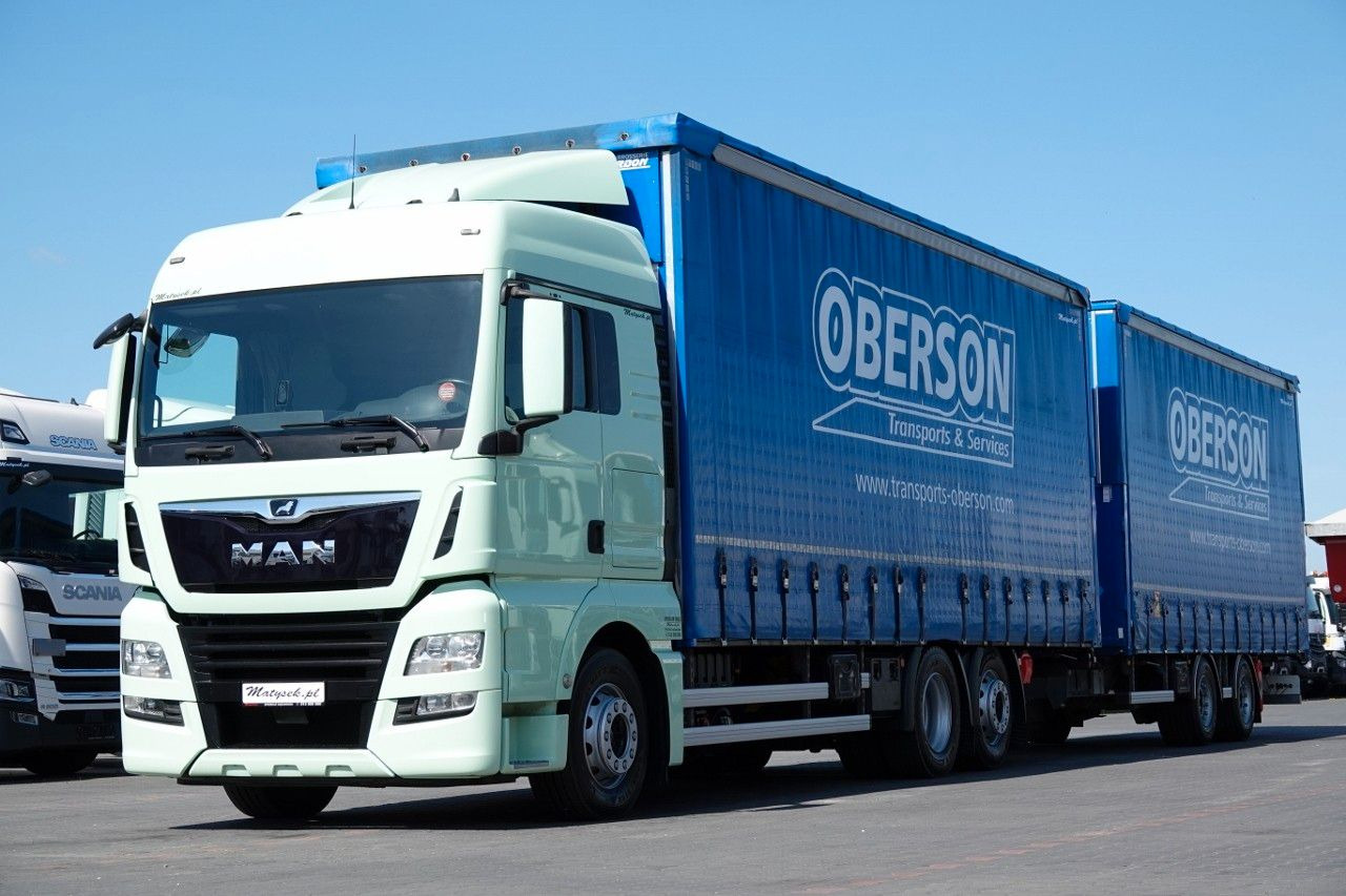 MAN TGX 26.460 / ZESTAW TANDEM PRZEJAZDOWY / 120 M3 - Kravas automašīna ar tentu: foto 2 MAN TGX 26.460 / ZESTAW TANDEM PRZEJAZDOWY / 120 M3 - Kravas automašīna ar tentu: foto 2