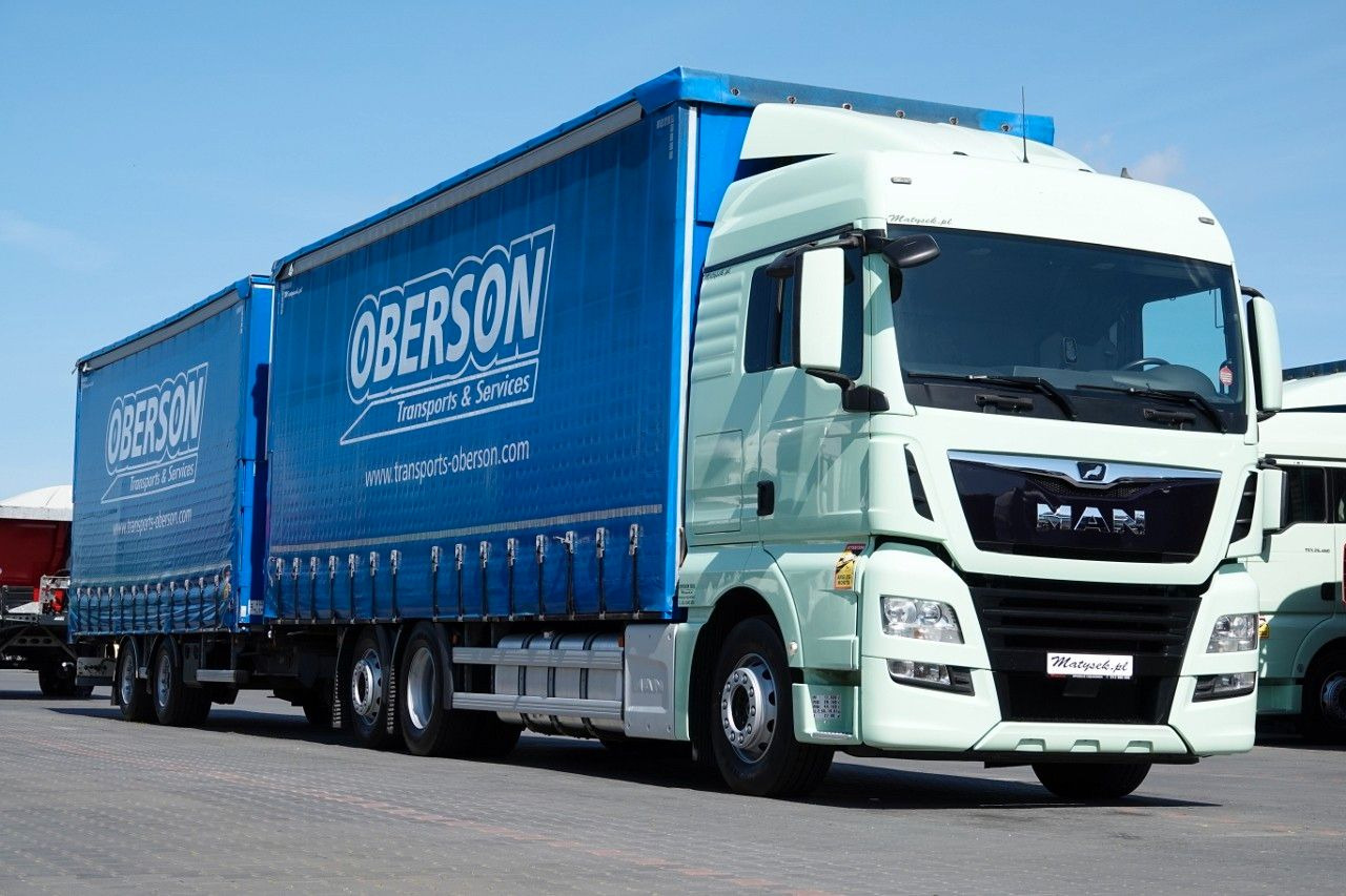 MAN TGX 26.460 / ZESTAW TANDEM PRZEJAZDOWY / 120 M3 - Kravas automašīna ar tentu: foto 1 MAN TGX 26.460 / ZESTAW TANDEM PRZEJAZDOWY / 120 M3 - Kravas automašīna ar tentu: foto 1