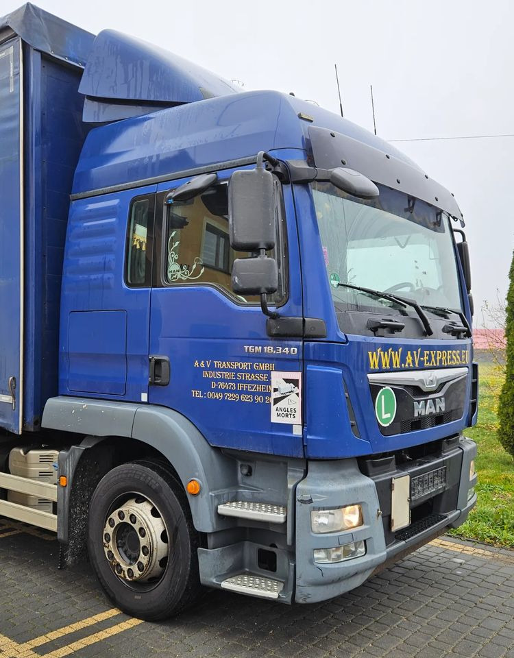 MAN TGM 18.340 / FIRANKA / SPROWADZONY / 9100 ŁADOWNOŚĆ / 18 PALET / E6 / WINDA / - Kravas automašīna ar tentu: foto 5 MAN TGM 18.340 / FIRANKA / SPROWADZONY / 9100 ŁADOWNOŚĆ / 18 PALET / E6 / WINDA / - Kravas automašīna ar tentu: foto 5
