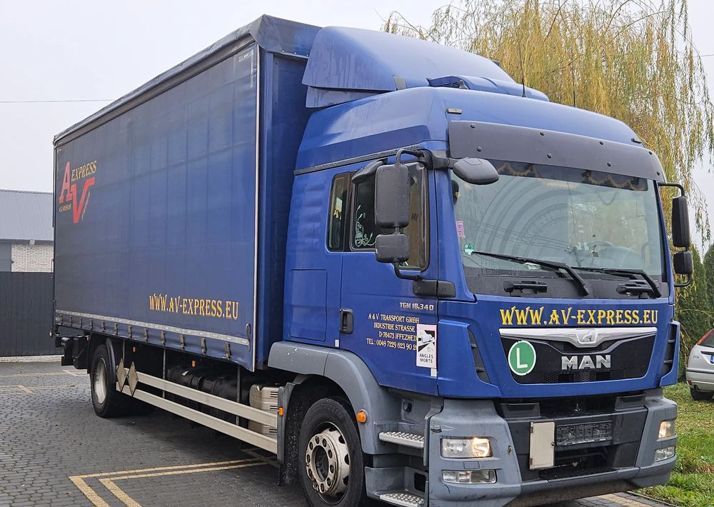 MAN TGM 18.340 / FIRANKA / SPROWADZONY / 9100 ŁADOWNOŚĆ / 18 PALET / E6 / WINDA / - Kravas automašīna ar tentu: foto 2 MAN TGM 18.340 / FIRANKA / SPROWADZONY / 9100 ŁADOWNOŚĆ / 18 PALET / E6 / WINDA / - Kravas automašīna ar tentu: foto 2