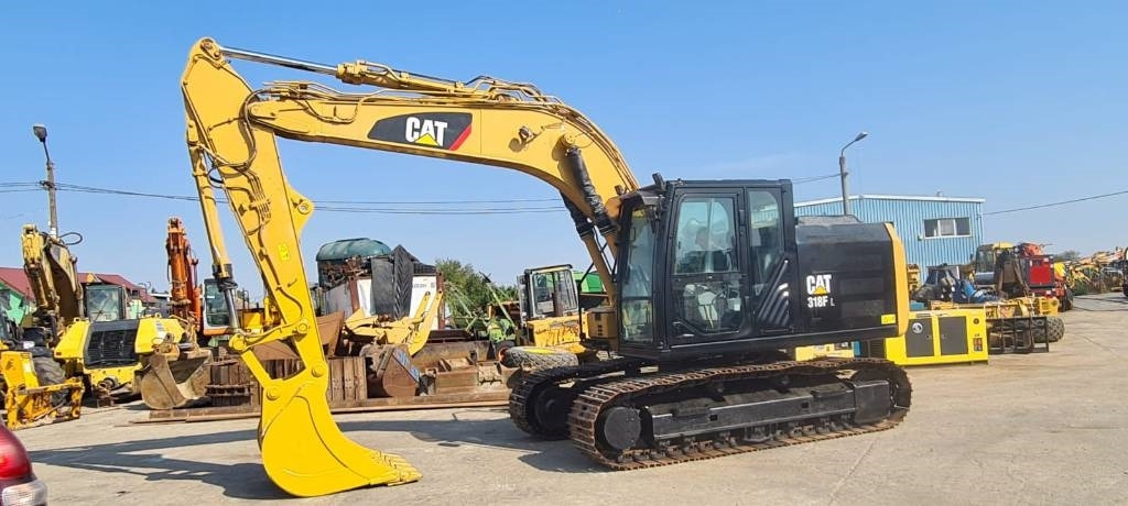 CAT 318FL - Kāpurķēžu ekskavators: foto 1 CAT 318FL - Kāpurķēžu ekskavators: foto 1