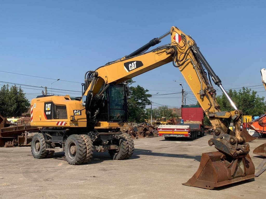 CAT M 318 F - Riteņu ekskavators: foto 5 CAT M 318 F - Riteņu ekskavators: foto 5