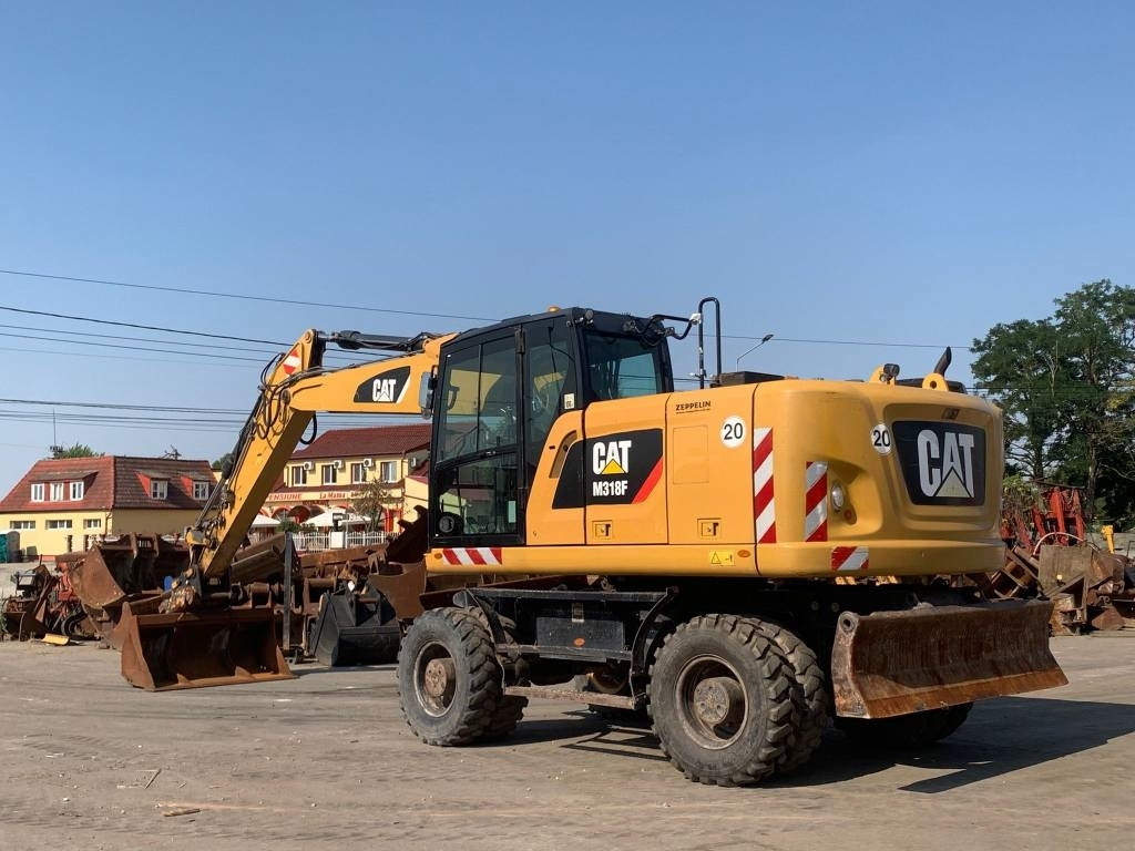 CAT M 318 F - Riteņu ekskavators: foto 3 CAT M 318 F - Riteņu ekskavators: foto 3