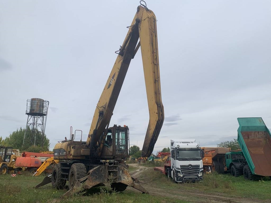 Atkritumu iekrāvējs CAT M 325 C L MH: foto 6 Atkritumu iekrāvējs CAT M 325 C L MH: foto 6