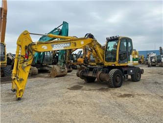 Doosan DX 160 WR - Riteņu ekskavators: foto 1 Doosan DX 160 WR - Riteņu ekskavators: foto 1