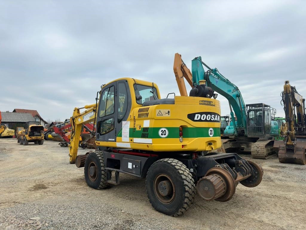 Doosan DX 160 WR - Riteņu ekskavators: foto 2 Doosan DX 160 WR - Riteņu ekskavators: foto 2