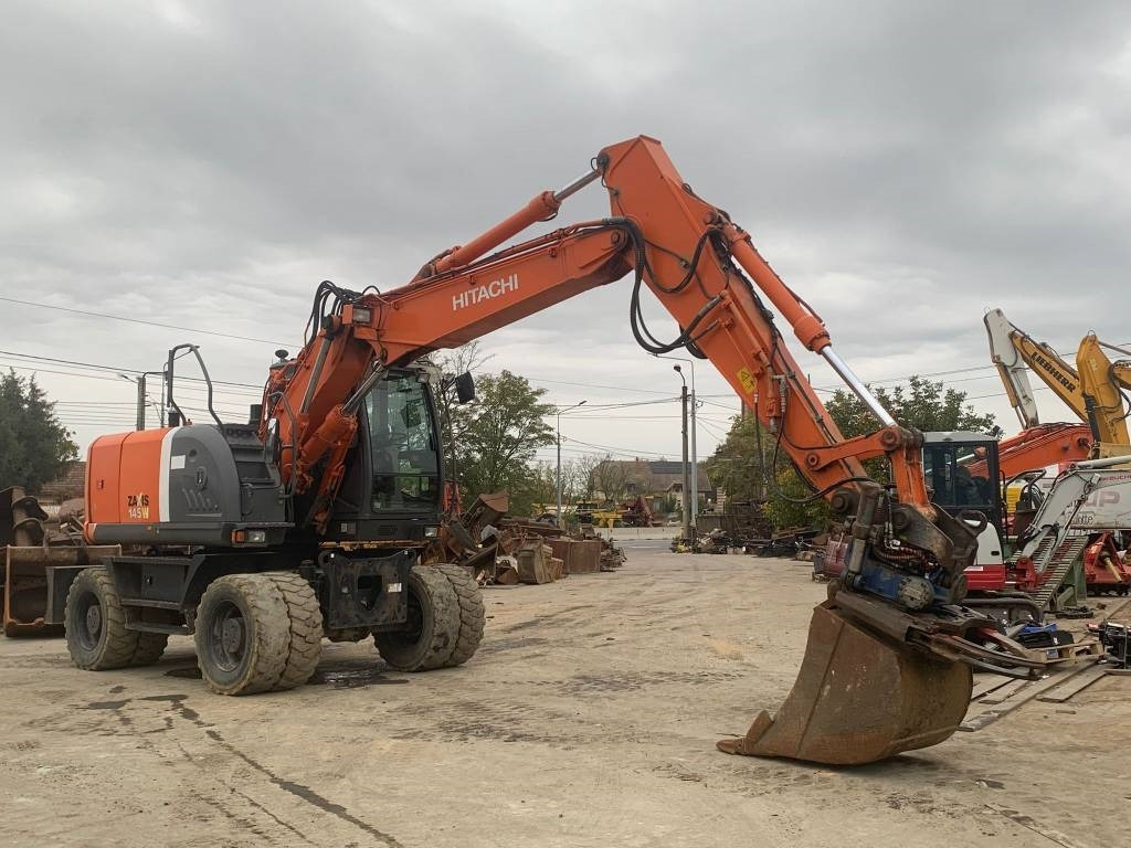 Hitachi ZX 145 W-3+SMP Rototilt  - Riteņu ekskavators: foto 4 Hitachi ZX 145 W-3+SMP Rototilt  - Riteņu ekskavators: foto 4