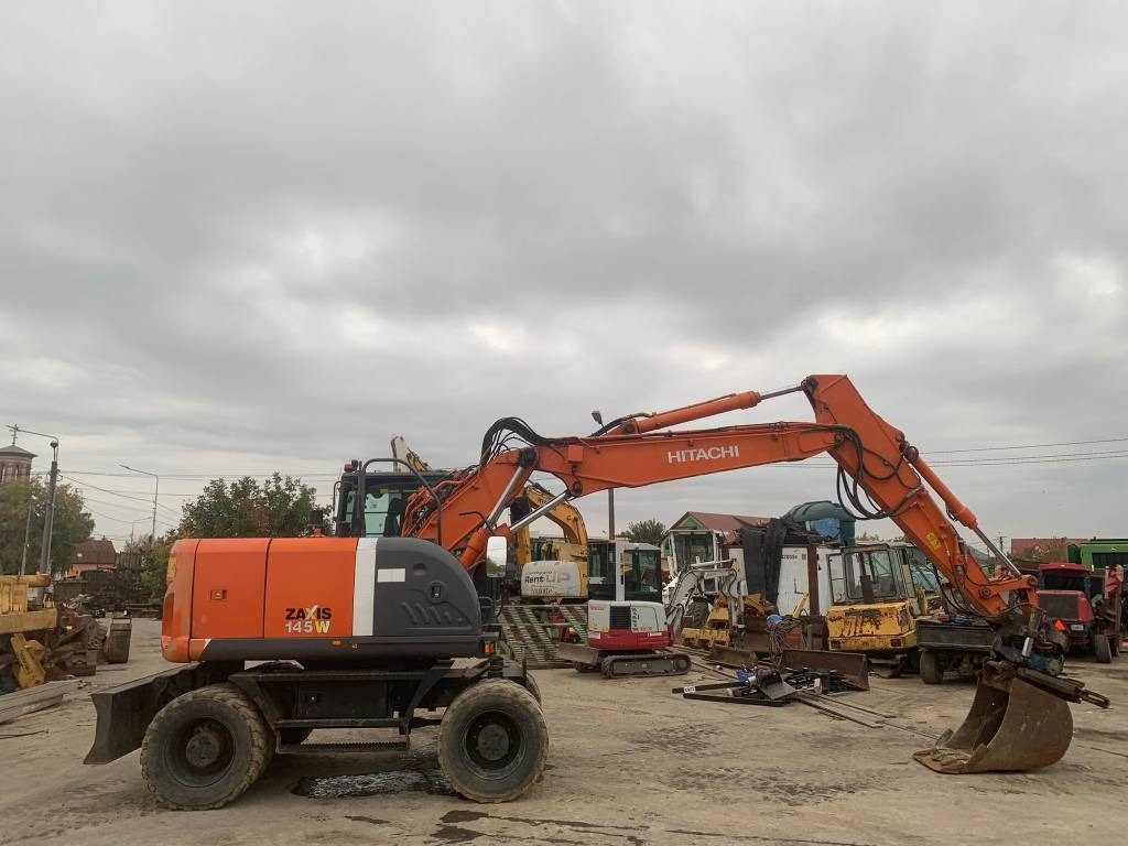 Hitachi ZX 145 W-3+SMP Rototilt  - Riteņu ekskavators: foto 5 Hitachi ZX 145 W-3+SMP Rototilt  - Riteņu ekskavators: foto 5
