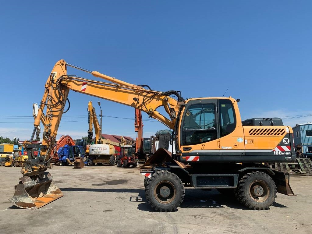 Hyundai Robex 180 W-9 A  - Riteņu ekskavators: foto 2 Hyundai Robex 180 W-9 A  - Riteņu ekskavators: foto 2