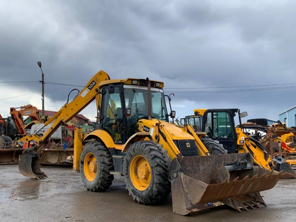 JCB 4 CX - Ekskavators-iekrāvējs: foto 2 JCB 4 CX - Ekskavators-iekrāvējs: foto 2