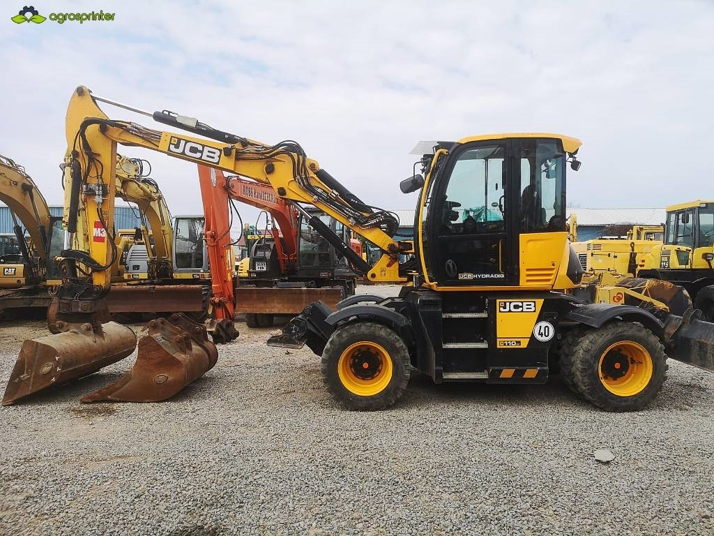 JCB Hydradig 110W - Riteņu ekskavators: foto 2 JCB Hydradig 110W - Riteņu ekskavators: foto 2