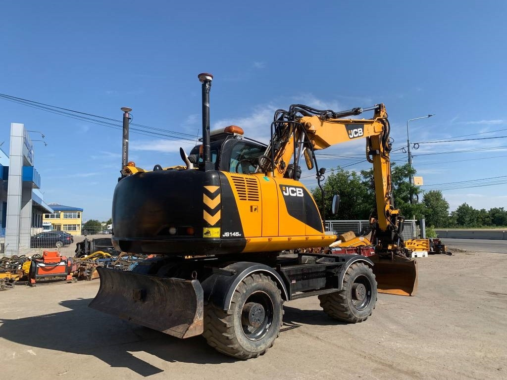 JCB JS 145 W+Engcon Rototilt+Sistem Laser 2D Leica Ico - Riteņu ekskavators: foto 4 JCB JS 145 W+Engcon Rototilt+Sistem Laser 2D Leica Ico - Riteņu ekskavators: foto 4