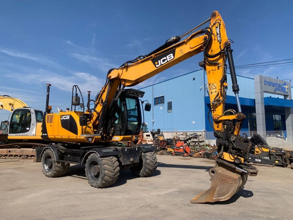 JCB JS 145 W+Engcon Rototilt+Sistem Laser 2D Leica Ico - Riteņu ekskavators: foto 2 JCB JS 145 W+Engcon Rototilt+Sistem Laser 2D Leica Ico - Riteņu ekskavators: foto 2