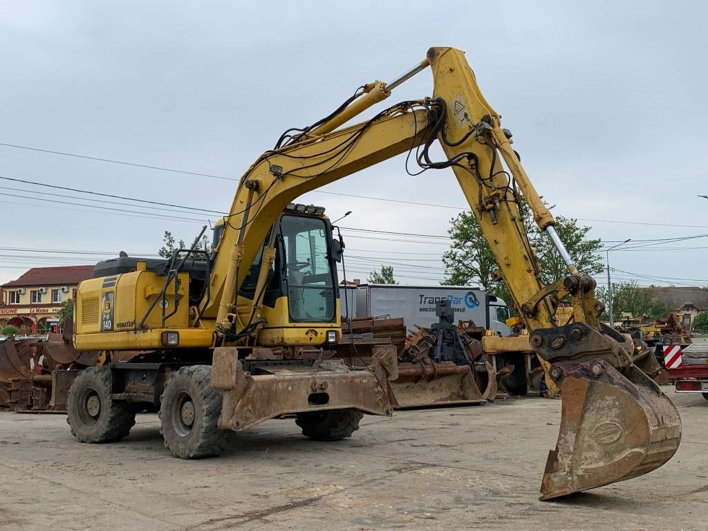 Komatsu PW 140-7 - Riteņu ekskavators: foto 5 Komatsu PW 140-7 - Riteņu ekskavators: foto 5