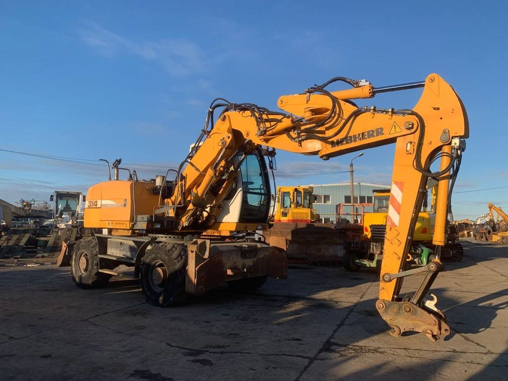 Liebherr A 314 Litronic - Riteņu ekskavators: foto 5 Liebherr A 314 Litronic - Riteņu ekskavators: foto 5