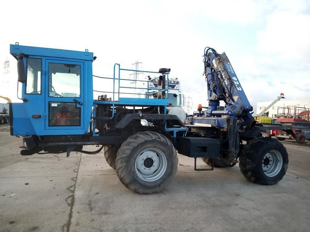 Mercedes-Benz Unimog - Kravas auto ar manipulatoru: foto 2 Mercedes-Benz Unimog - Kravas auto ar manipulatoru: foto 2