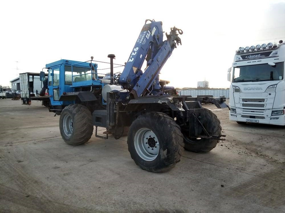 Mercedes-Benz Unimog - Kravas auto ar manipulatoru: foto 3 Mercedes-Benz Unimog - Kravas auto ar manipulatoru: foto 3