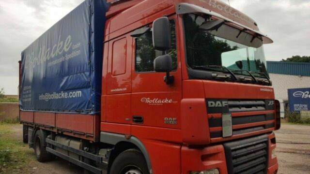 DAF 105-410 XF Plane Spriegel German Truck - Kravas automašīna ar tentu: foto 1 DAF 105-410 XF Plane Spriegel German Truck - Kravas automašīna ar tentu: foto 1