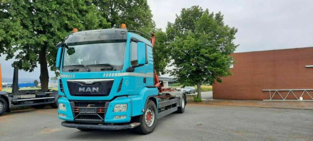 MAN TGS 18.440 Abroller mit Funk +Kran vor. - Pacēlājs ar āķi, Kravas auto ar manipulatoru: foto 1 MAN TGS 18.440 Abroller mit Funk +Kran vor. - Pacēlājs ar āķi, Kravas auto ar manipulatoru: foto 1