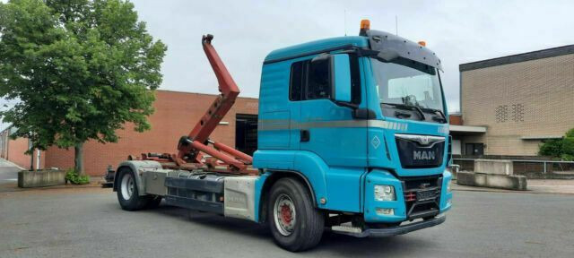 MAN TGS 18.440 Abroller mit Funk +Kran vor - Pacēlājs ar āķi, Kravas auto ar manipulatoru: foto 2 MAN TGS 18.440 Abroller mit Funk +Kran vor - Pacēlājs ar āķi, Kravas auto ar manipulatoru: foto 2