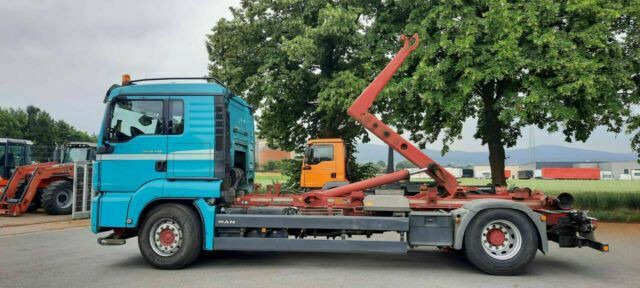 MAN TGS 18.440 Abroller mit Funk +Kran vor - Pacēlājs ar āķi, Kravas auto ar manipulatoru: foto 4 MAN TGS 18.440 Abroller mit Funk +Kran vor - Pacēlājs ar āķi, Kravas auto ar manipulatoru: foto 4