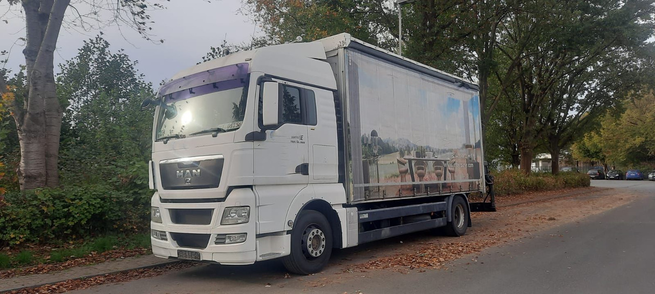 MAN TGX 18.360PS 4x2 G.Haus Kran+Funk - Kravas automašīna ar tentu, Kravas auto ar manipulatoru: foto 1 MAN TGX 18.360PS 4x2 G.Haus Kran+Funk - Kravas automašīna ar tentu, Kravas auto ar manipulatoru: foto 1