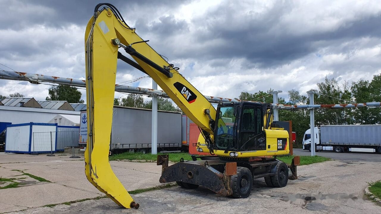 Caterpillar M 318 D MH - Atkritumu iekrāvējs: foto 3 Caterpillar M 318 D MH - Atkritumu iekrāvējs: foto 3