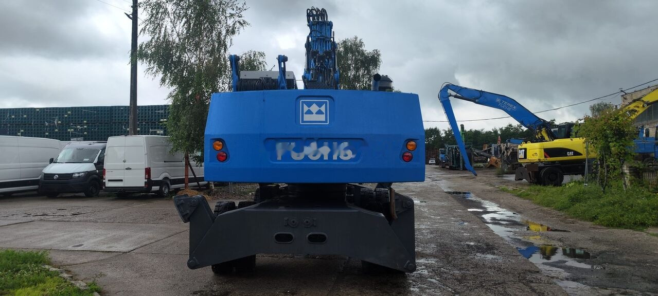 Atkritumu iekrāvējs Fuchs MHL 340 D FQC magnet generator: foto 8