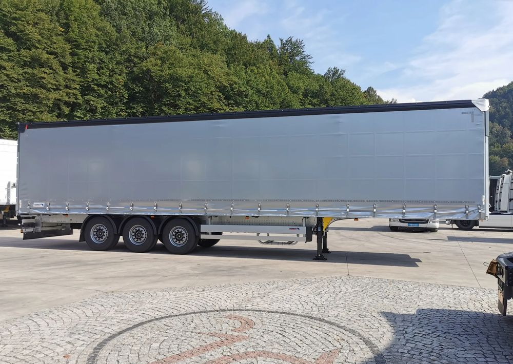 Schmitz Cargobull STANDARD + DACH VARIOS SIMPLE - Tenta puspiekabe: foto 4 Schmitz Cargobull STANDARD + DACH VARIOS SIMPLE - Tenta puspiekabe: foto 4