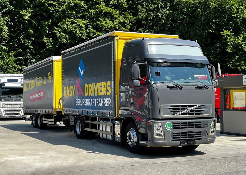 Volvo FH 420 4x2 // Zestaw + przyczepa Schwarzmuller // Jak Nowy // Niski przebieg // Automat // Idealny !!! - Kravas automašīna ar tentu: foto 1 Volvo FH 420 4x2 // Zestaw + przyczepa Schwarzmuller // Jak Nowy // Niski przebieg // Automat // Idealny !!! - Kravas automašīna ar tentu: foto 1