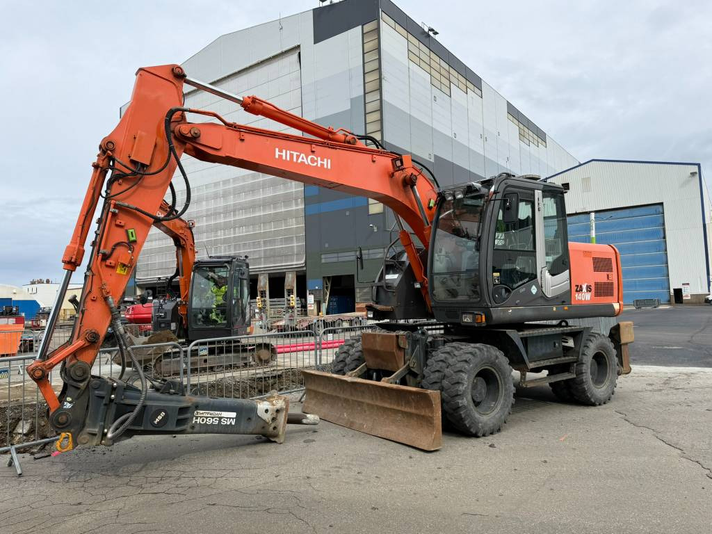 Hitachi ZX 140 W-3 - Riteņu ekskavators: foto 1 Hitachi ZX 140 W-3 - Riteņu ekskavators: foto 1