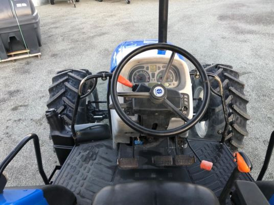 New Holland TL100A tracteur - Traktors: foto 5 New Holland TL100A tracteur - Traktors: foto 5