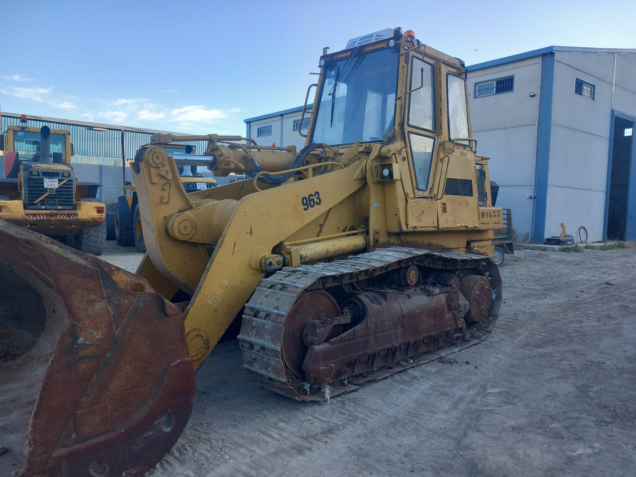 Caterpillar 963 - Kāpurķēžu iekrāvējs: foto 1 Caterpillar 963 - Kāpurķēžu iekrāvējs: foto 1