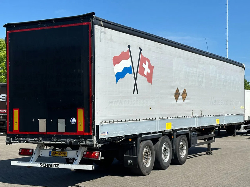 Schmitz Cargobull Schuifzeil met Borden / Disc-Brakes / Huckepack / Code XL - Tenta puspiekabe: foto 1 Schmitz Cargobull Schuifzeil met Borden / Disc-Brakes / Huckepack / Code XL - Tenta puspiekabe: foto 1