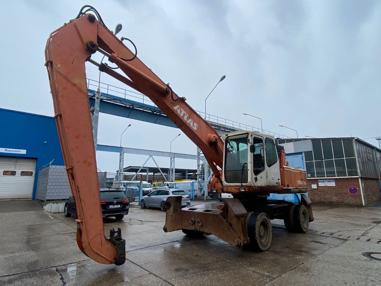 Atlas 1704 MI mit Greifer Umschlagbagger Lang - Riteņu ekskavators: foto 4 Atlas 1704 MI mit Greifer Umschlagbagger Lang - Riteņu ekskavators: foto 4
