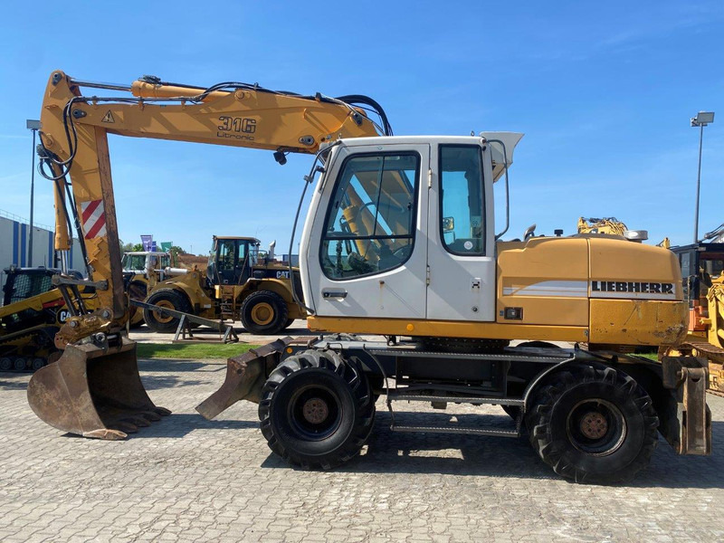 Liebherr A316 Litronic NVT - Riteņu ekskavators: foto 2 Liebherr A316 Litronic NVT - Riteņu ekskavators: foto 2