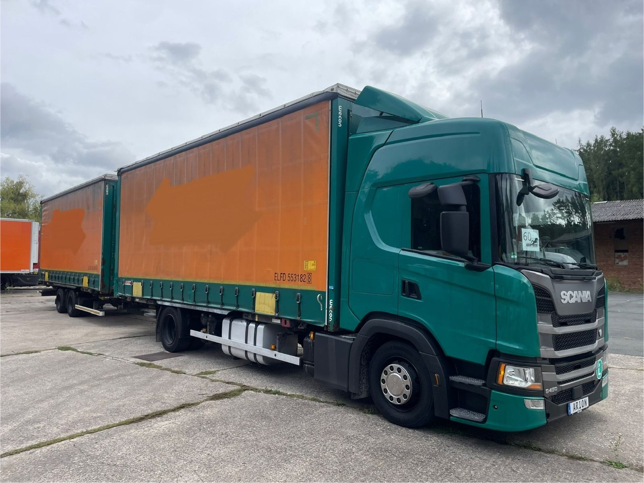 Scania G450 Pritsche+Plane/ANHÄNGER/KOTSCHENREUTHER - Kravas automašīna ar tentu: foto 1 Scania G450 Pritsche+Plane/ANHÄNGER/KOTSCHENREUTHER - Kravas automašīna ar tentu: foto 1