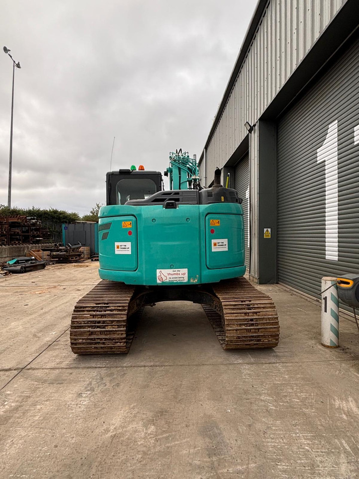 Kobelco SK140SRLC-5 - Kāpurķēžu ekskavators: foto 4 Kobelco SK140SRLC-5 - Kāpurķēžu ekskavators: foto 4