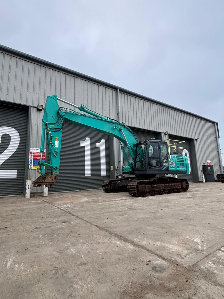 Kobelco SK210HLC-10 Hybrid - Kāpurķēžu ekskavators: foto 1 Kobelco SK210HLC-10 Hybrid - Kāpurķēžu ekskavators: foto 1