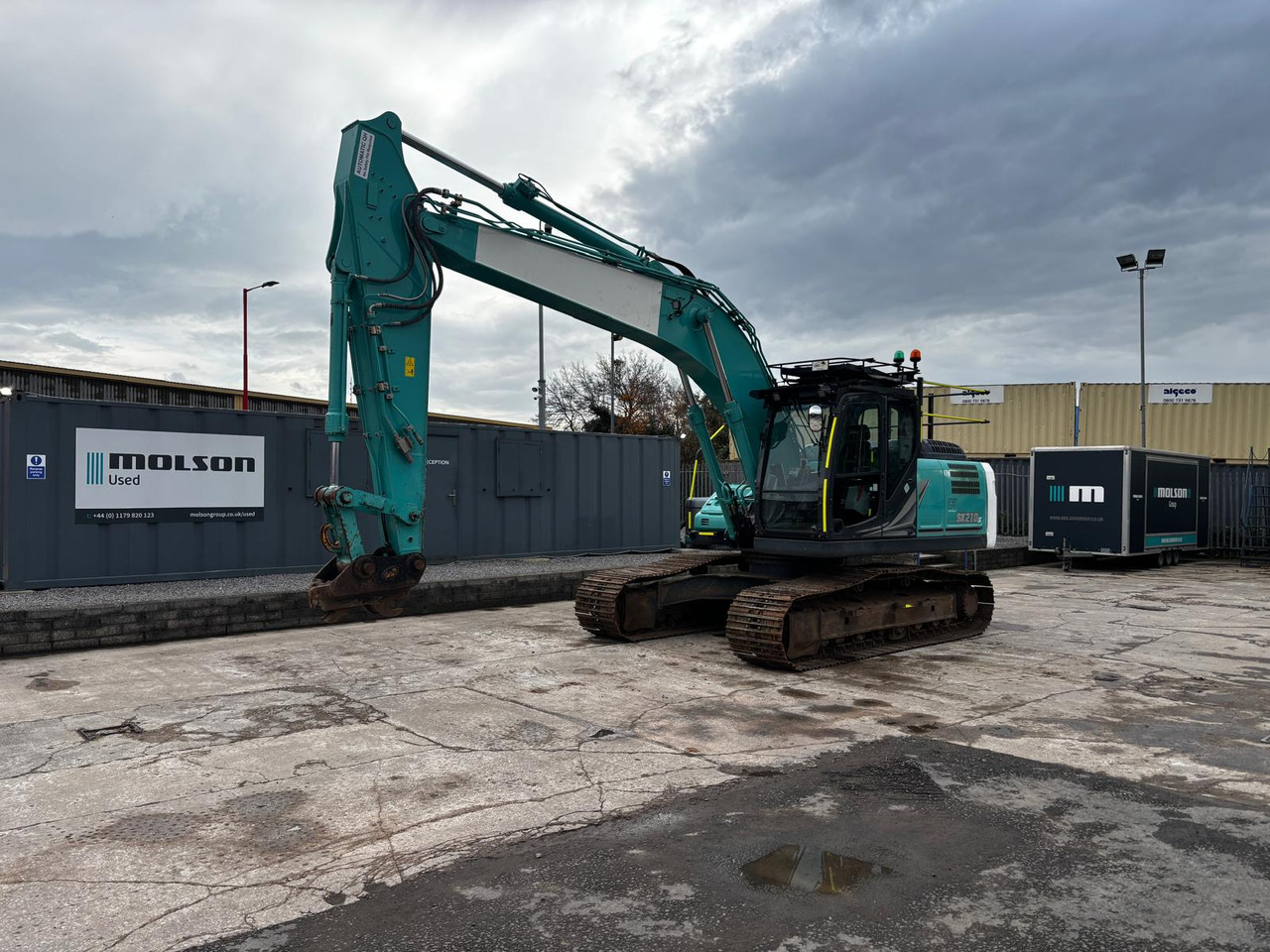 Kobelco SK210LC-11 - Kāpurķēžu ekskavators: foto 1 Kobelco SK210LC-11 - Kāpurķēžu ekskavators: foto 1