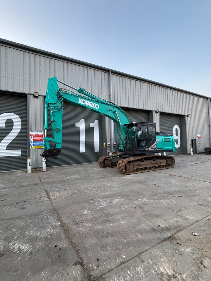 Kobelco SK210LC-11 - Kāpurķēžu ekskavators: foto 1 Kobelco SK210LC-11 - Kāpurķēžu ekskavators: foto 1