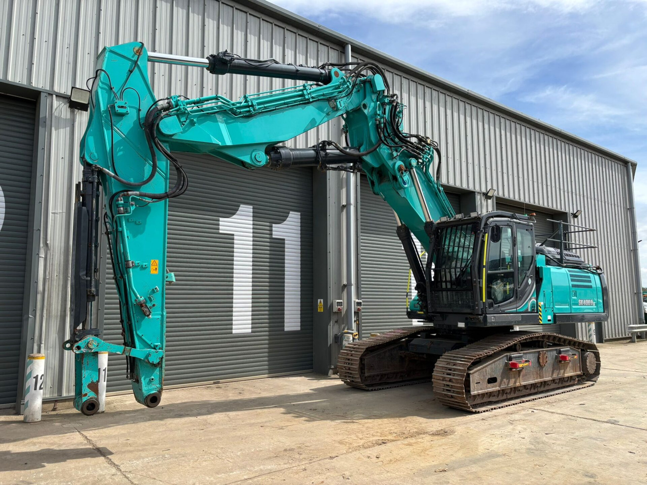 Kobelco SK400DLC-10 25m 3 Piece Demolition Arm - Kāpurķēžu ekskavators: foto 1 Kobelco SK400DLC-10 25m 3 Piece Demolition Arm - Kāpurķēžu ekskavators: foto 1