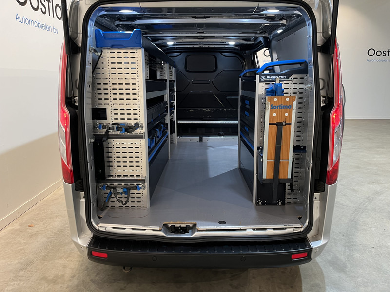 Ford Transit Custom 300 2.0 TDCI L2H1 Trend 130 PK Servicebus / Sortimo Inrichting / Euro 6 / Airco / Cruise Control / Klep / PDC / 3-Zits - Mazs furgons: foto 4 Ford Transit Custom 300 2.0 TDCI L2H1 Trend 130 PK Servicebus / Sortimo Inrichting / Euro 6 / Airco / Cruise Control / Klep / PDC / 3-Zits - Mazs furgons: foto 4