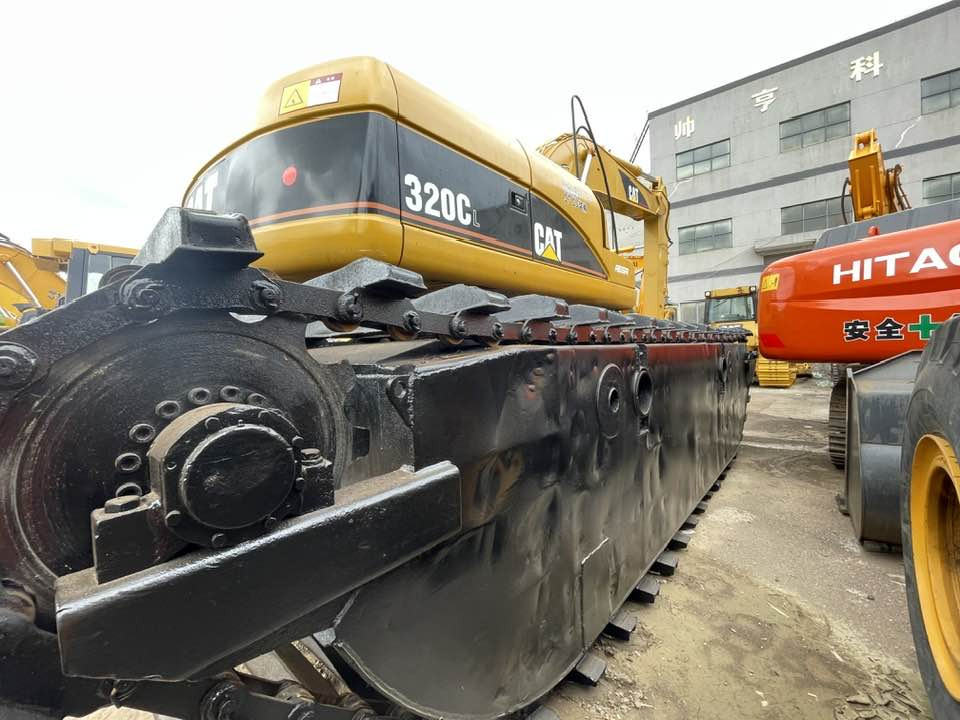 Caterpillar 320CL - Ekskavators: foto 2 Caterpillar 320CL - Ekskavators: foto 2