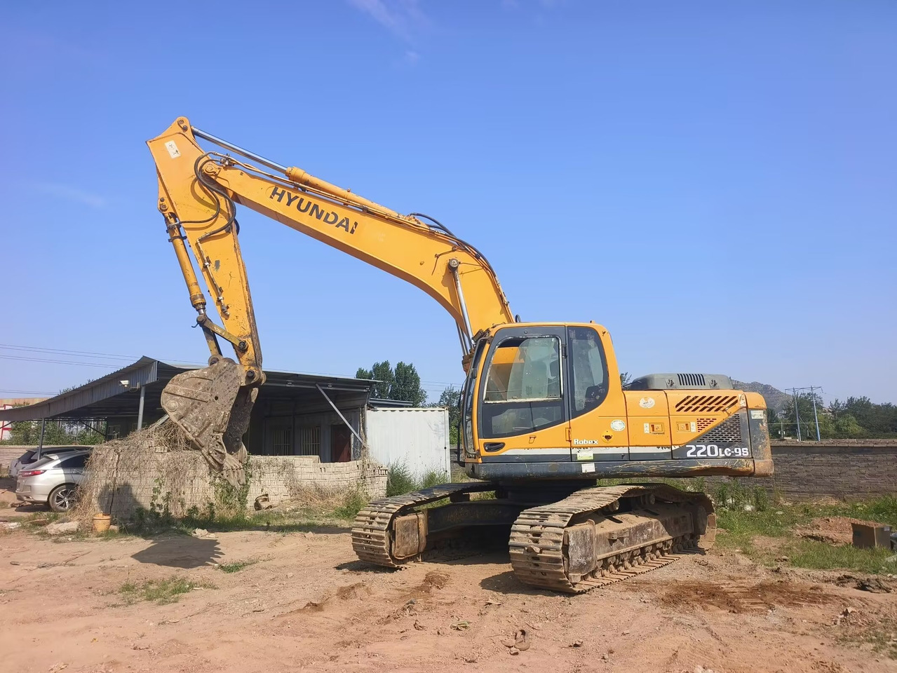 Hyundai R220LC - Ekskavators: foto 1 Hyundai R220LC - Ekskavators: foto 1