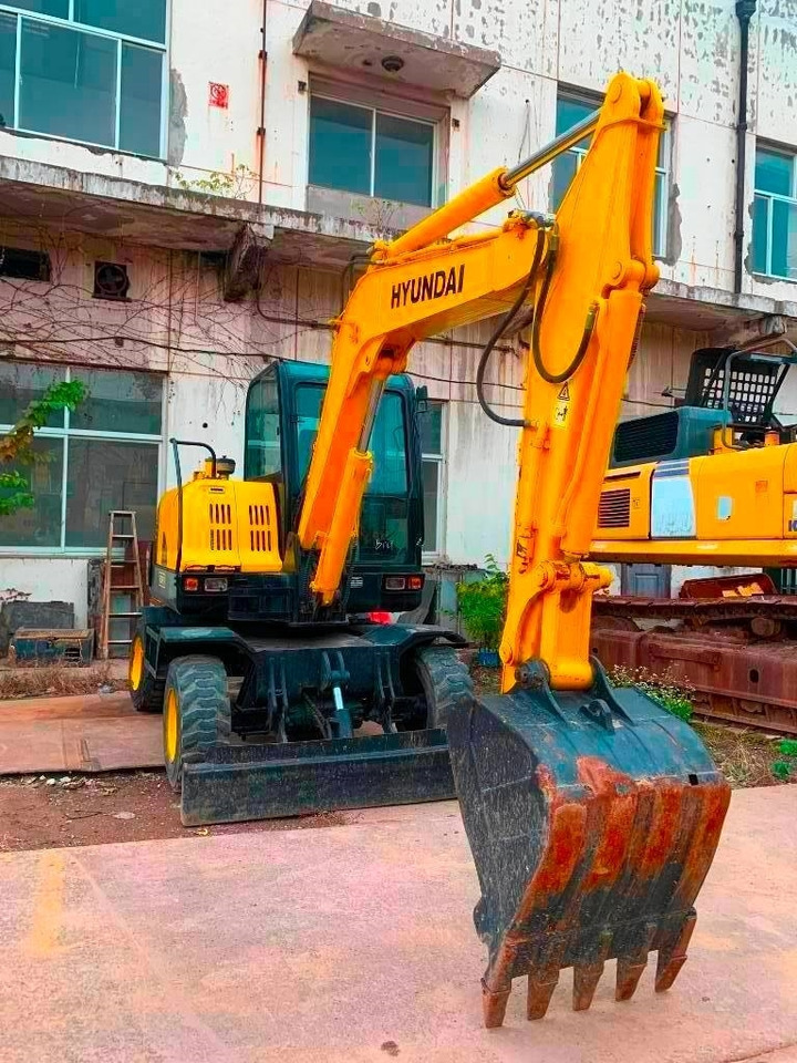 Hyundai Robex 60 W-7  - Riteņu ekskavators: foto 2 Hyundai Robex 60 W-7  - Riteņu ekskavators: foto 2