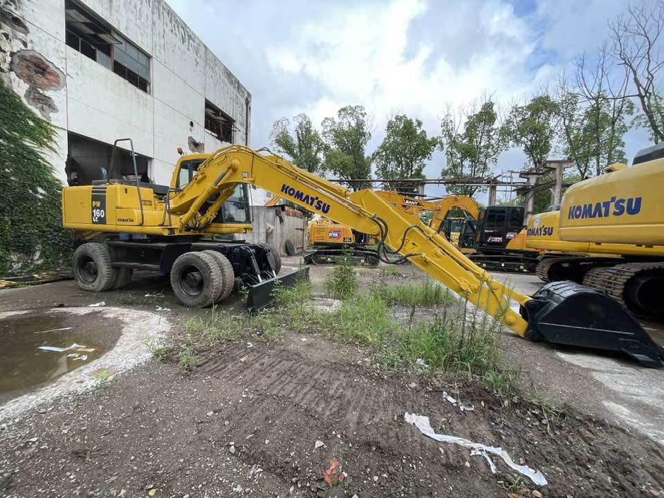 Komatsu PW160 - Riteņu ekskavators: foto 1 Komatsu PW160 - Riteņu ekskavators: foto 1