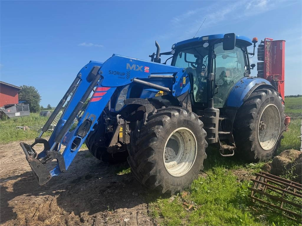 New Holland T7060TG - Traktors: foto 1 New Holland T7060TG - Traktors: foto 1