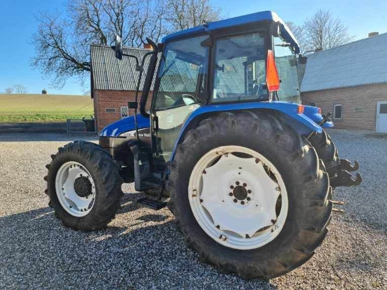 New Holland TL100-4WD - Traktors: foto 2 New Holland TL100-4WD - Traktors: foto 2